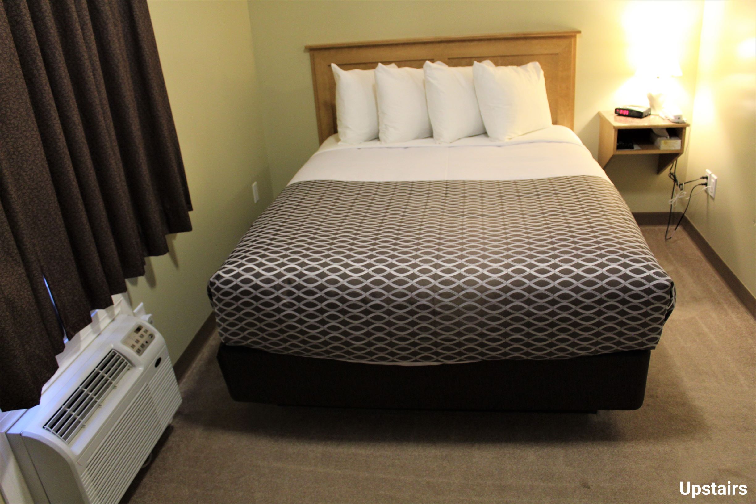 2 BEDROOM EXECUTIVE SUITE - 2 Bedrooms w/ 1 Queen Bed Per Room plus Queen Size pull-out couch in the Living Room (on LaCreteInn&Suites.ca)