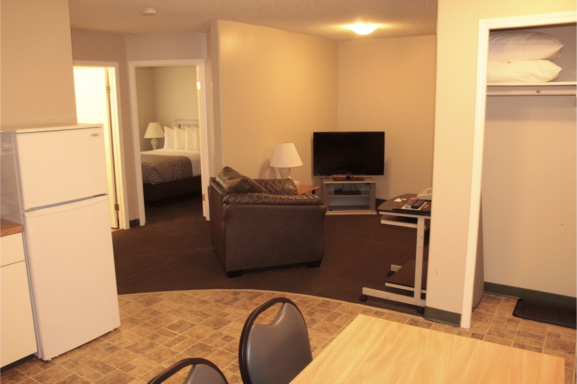 2 BEDROOM SUITE - 2 Bedroom Room with 1 Queen Bed Per Room, with Double Bed In Couch (on LaCreteInn&Suites.ca)