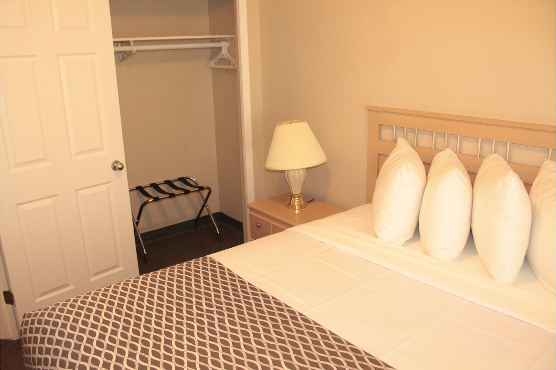 2 BEDROOM SUITE - 2 Bedroom Room with 1 Queen Bed Per Room, with Double Bed In Couch (on LaCreteInn&Suites.ca)