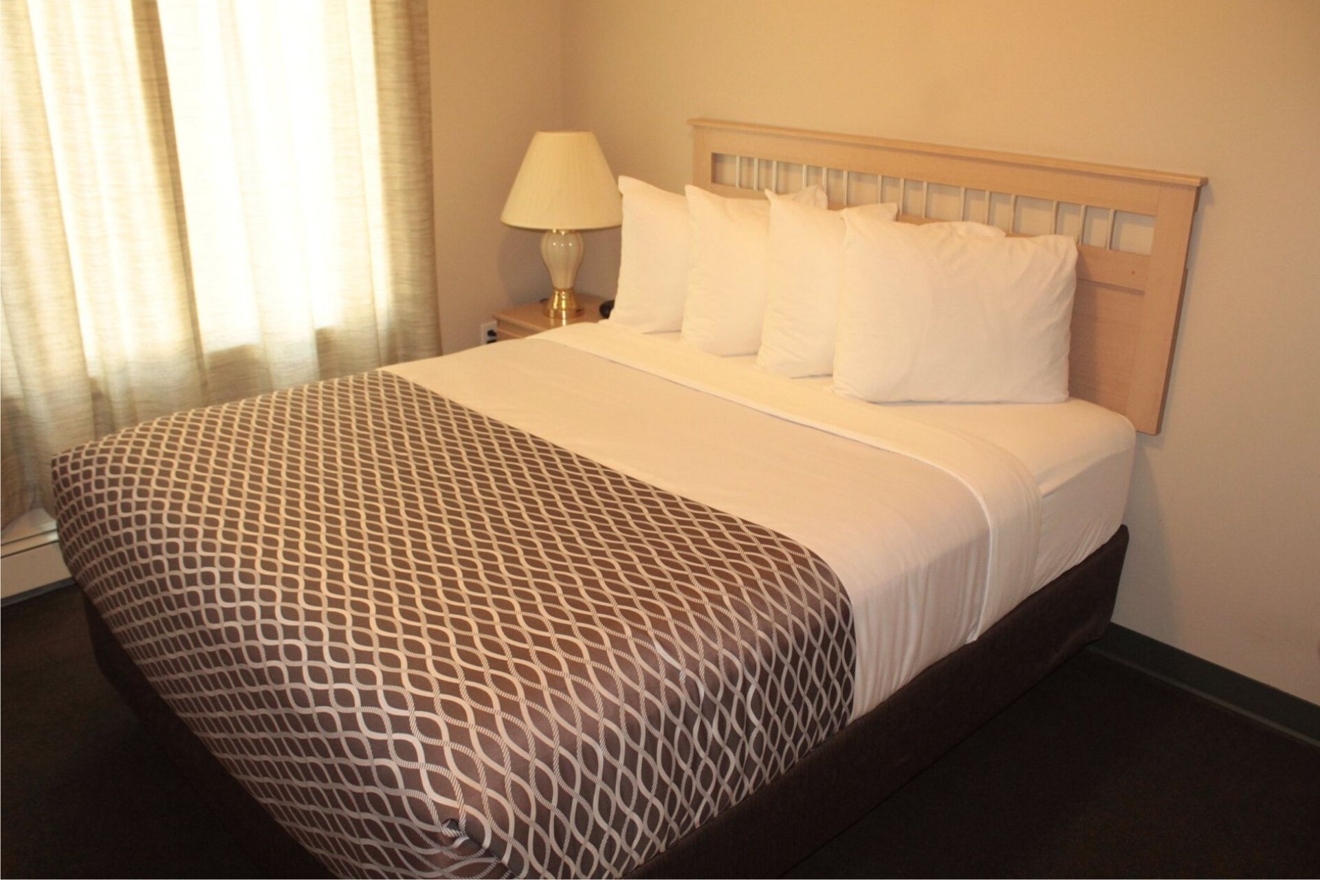 2 BEDROOM SUITE - 2 Bedroom Room with 1 Queen Bed Per Room, with Double Bed In Couch (on LaCreteInn&Suites.ca)