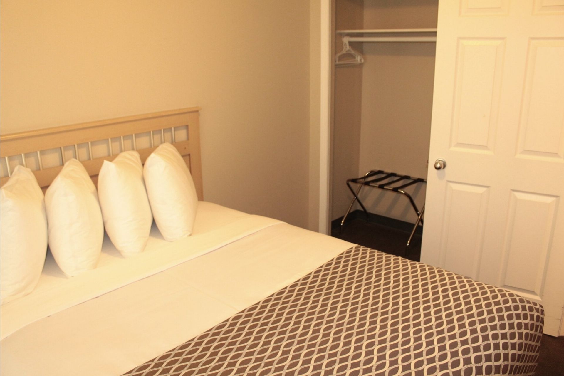 2 BEDROOM SUITE - 2 Bedroom Room with 1 Queen Bed Per Room, with Double Bed In Couch (on LaCreteInn&Suites.ca)